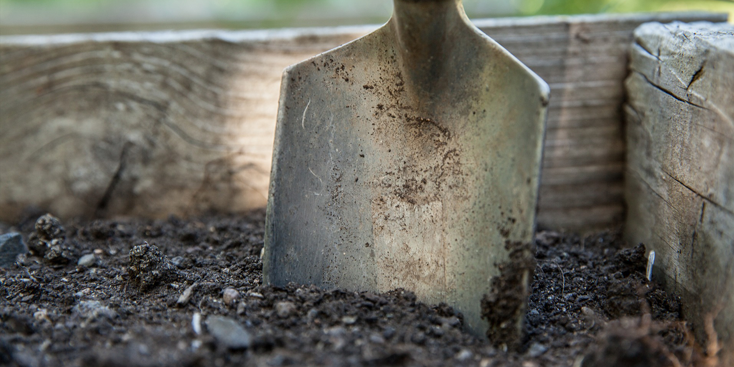 shovel digging soil